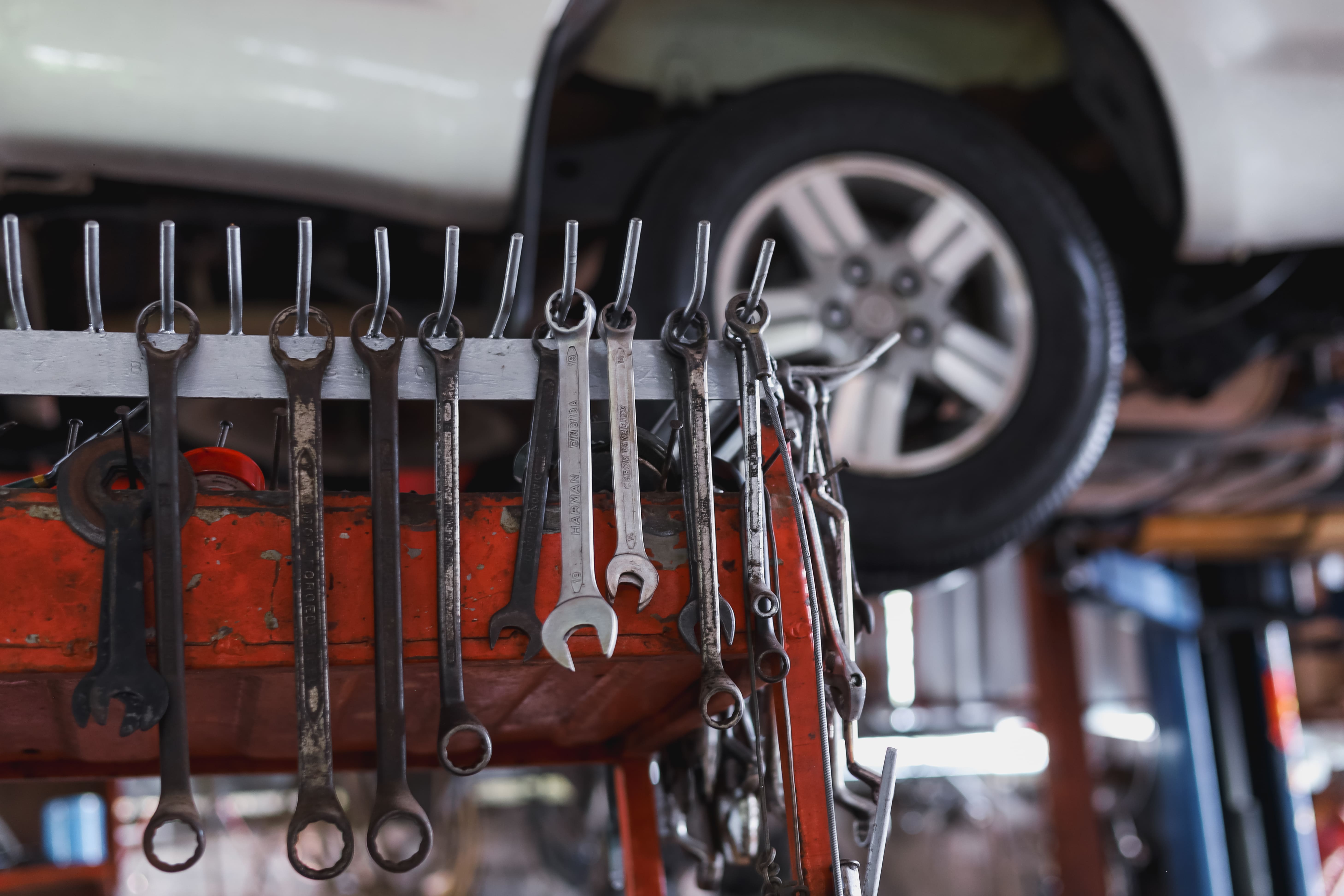 vecteezy_wrench-hanging-on-the-mechanic-s-table-in-the-garage_4534488